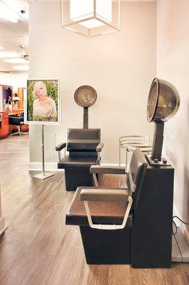 Hair dryers and color processing area at the Cahaba location of Tonya Jones SalonSpa, Birmingham's best salon featuring Aveda.