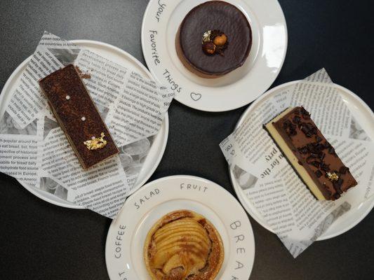 tiramisu strip, apple tartlet, black forest cheesecake, chocolate hazelnut cake