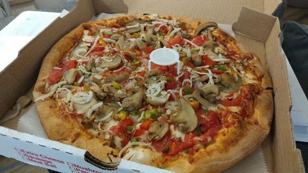 Small pizza with 4 veg toppings.