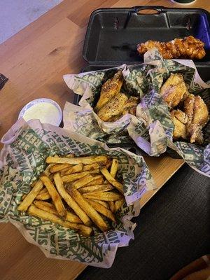 8 piece bone in combo - fries, lemon pepper and garlic parmesan wings. 1/2 of maple siracha tender.