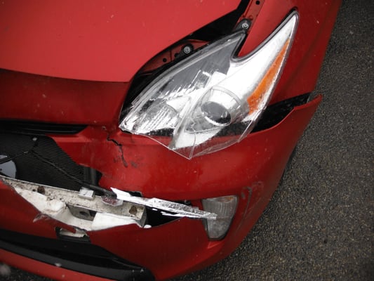 Toyota Prius Vs. back bumper of a pick up truck.