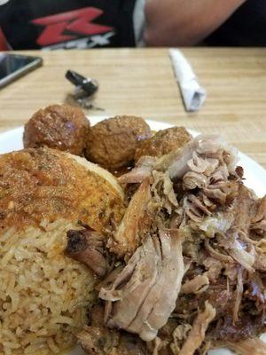 Pork shoulder with meatballs, yellow rice and potato salad fantastic!