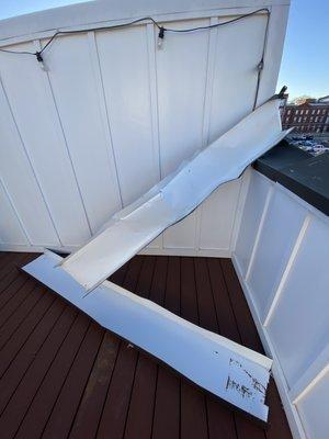 Damaged flashing on roof deck