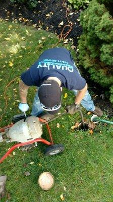 Cleaning out a clogged main line sewer