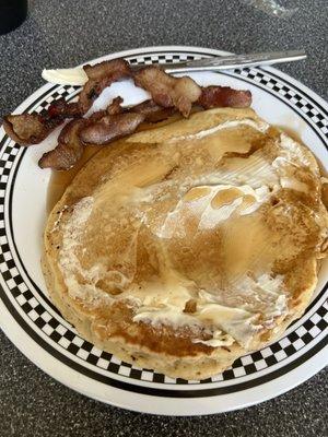 Pancake and side of bacon.