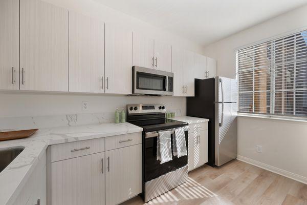 Kitchen at Missions at Rio Vista Apartments in San Diego