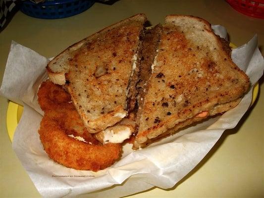 El Camino burger - a quarter pound patty melt, Swiss cheese, mayonnaise, XXX dressing, and grilled onions on rye bread.