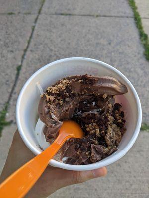 Vanilla ice cream and chocolate soft serve with brownie and PB bits