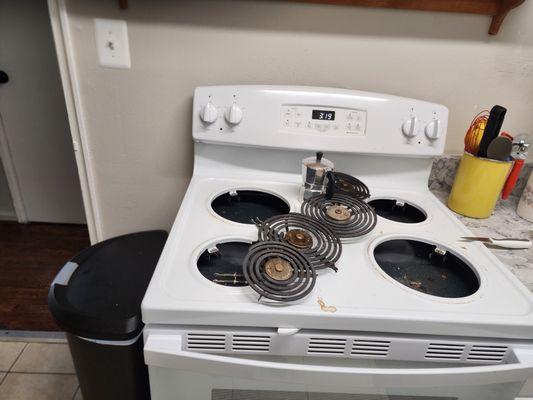 Dirty stove ready for cleaning