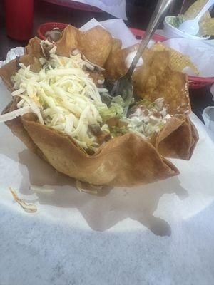 The steak taco salad.