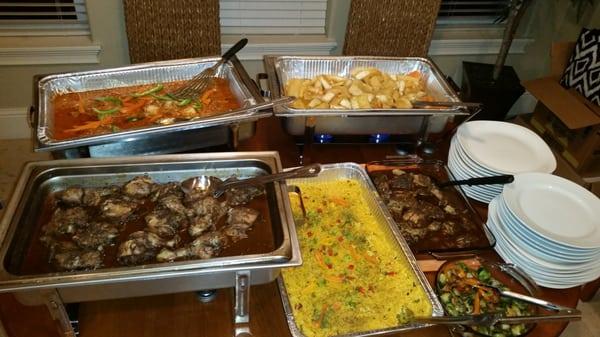 Jerk chicken, tilapia in cajun cream sauce, carmelized brussel sprouts, yucca and sweet potatoes, and yellow rice and veggies!