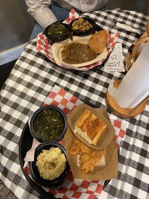 Country Fried Steak, okra, collard greens, and roll and fried pork chop, mac and cheese, and collard greens and roll