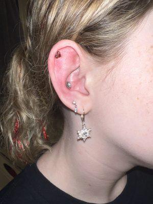 Conch and helix piercing