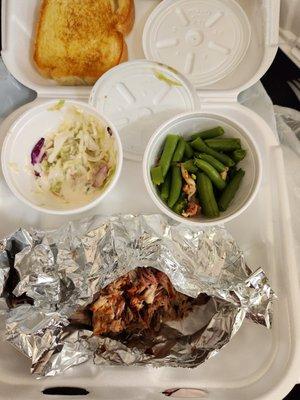 These are the 2 sides in my 2 meat dinner as found on first opening.  The cole slaw is less than half full, the green beans are proper.