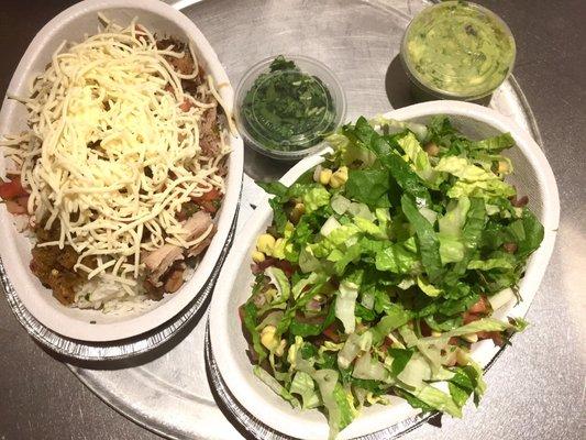 Dinner for two. A carnitas bowl with extra cheese and a veggie bowl topped with lettuce.