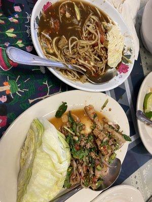 Spicy papaya salad and spicy ground beef with herbs and spices.  Very flavorful indeed.