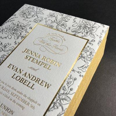 Letterpress + gold foil wedding invitation with gilded edges