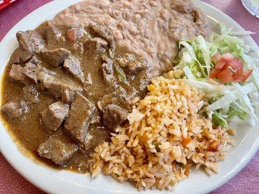 Garne Guisada, rice, and beans