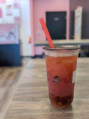 Strawberry green tea with boba