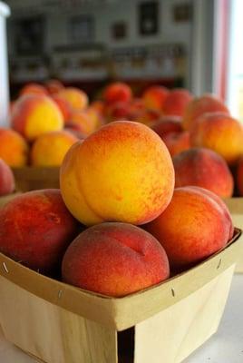 Evans Farms partners with local tree fruit farms to sell white and yellow peaches, nectarines, plums, and apples.