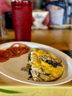 Farmers omelette with spinach and grill tomatoes