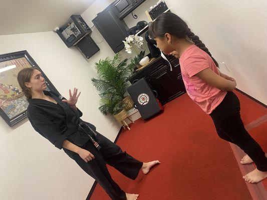 Sensei, Emily teaching some moves