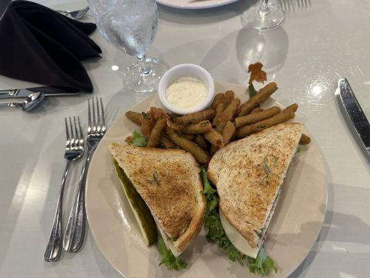 Club sandwich with breaded green beans.