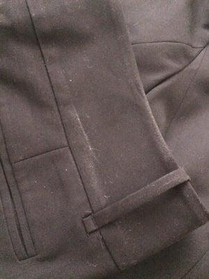 Dust line on the back of pants.