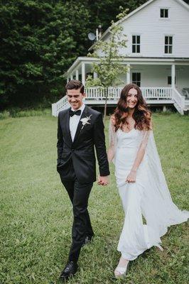 Jessica and Steve walking towards Handsome Hollow Barn for their ceremony