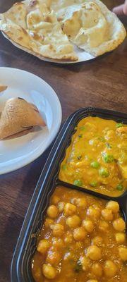 Chef special veggie lunch plus samosa. Korma veg and chana masala.