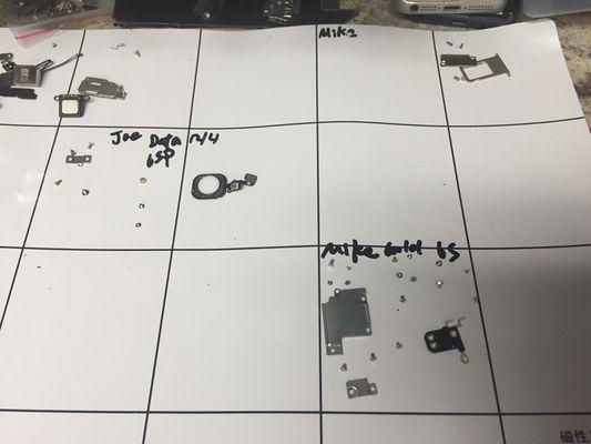 organized part while phone is undergoing complicate motherboard repair.