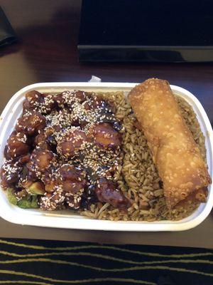 Sesame chicken combo with egg roll and fry rice.