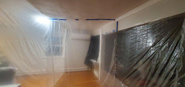 After finding dust pile  on the drop clothes 3 bedrooms, we contained the dust with vinyl curtains surrounding the installation site.