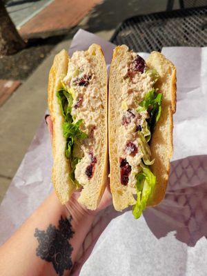 chicken salad sandwich with apples and craisins and lettuce