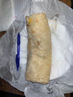 Breakfast burrito (pen for size)