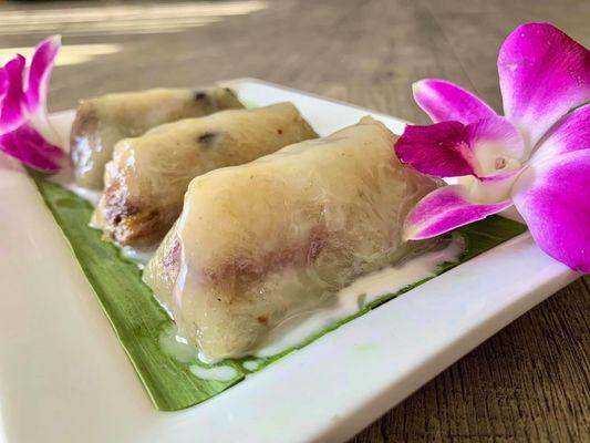 Sweet banana sticky rice cakes wrapped in banana leaf(served unwrapped)