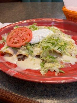 Enchilada Supreme with Cheese Sauce