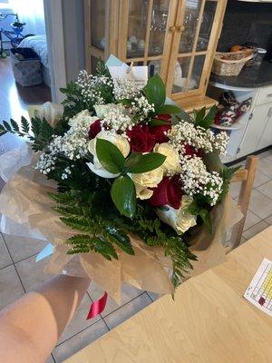 Beautiful 2 dozen bouquet mixed white and red roses. For my mother's birthday and she loved it!