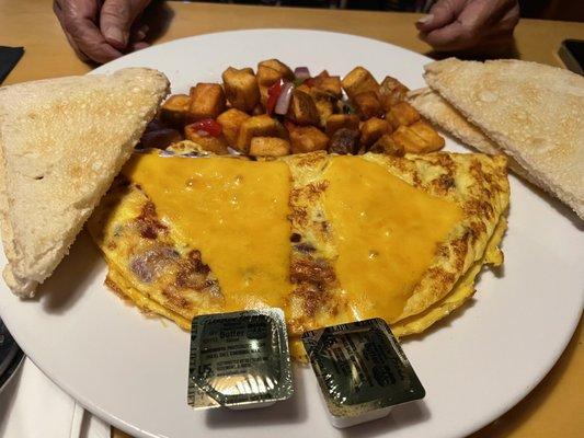 Denver omelet with potatoes and sourdough toast