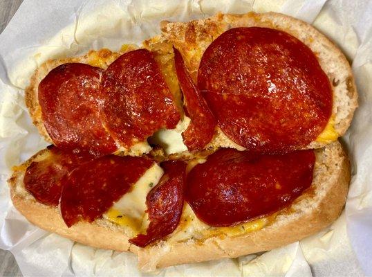 Garlic cheese toast with pepperoni added.