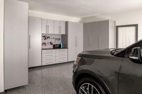 Arrive home to an organized garage with cabinets to keep your items tucked away and out of sight.