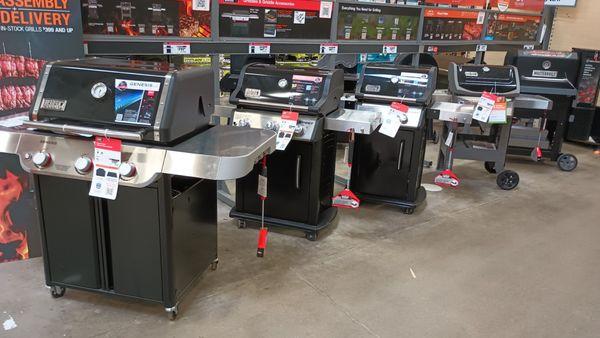 On the floor barbecue grill display in the store.