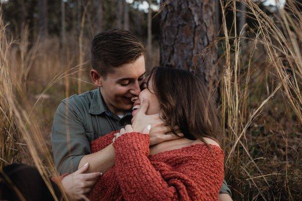 Newly engaged couple having engagement photos taken at Wekiwa Springs in Orlando, FL.