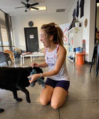 Me playing with the owner's pup after our hot HIIT Pilates class! I was crying of happiness as you can tell!