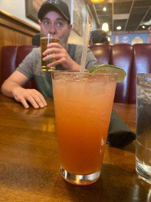 Strawberry house margarita during happy hour  & my dad drinking his coors light