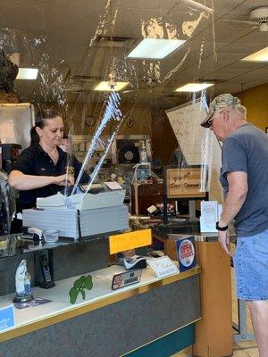 Employees without gloves or masks, touching money.... The other waitresses were also not wearing masks or gloves.  No way man.