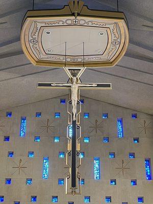 Cross above the alter.