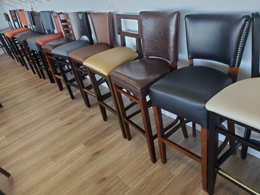 Variety of many upholstered bar stools for restaurants and bars