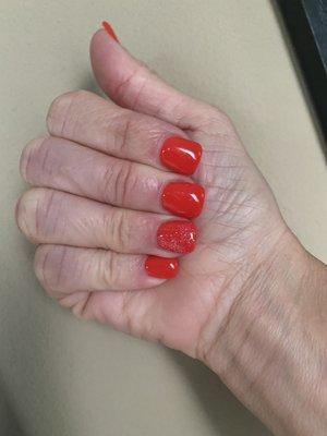 Beauty acrylic nails with red orange gel