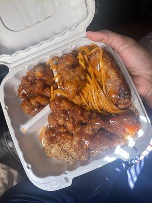 Fried rice, lo mein, and orange chicken with an egg roll